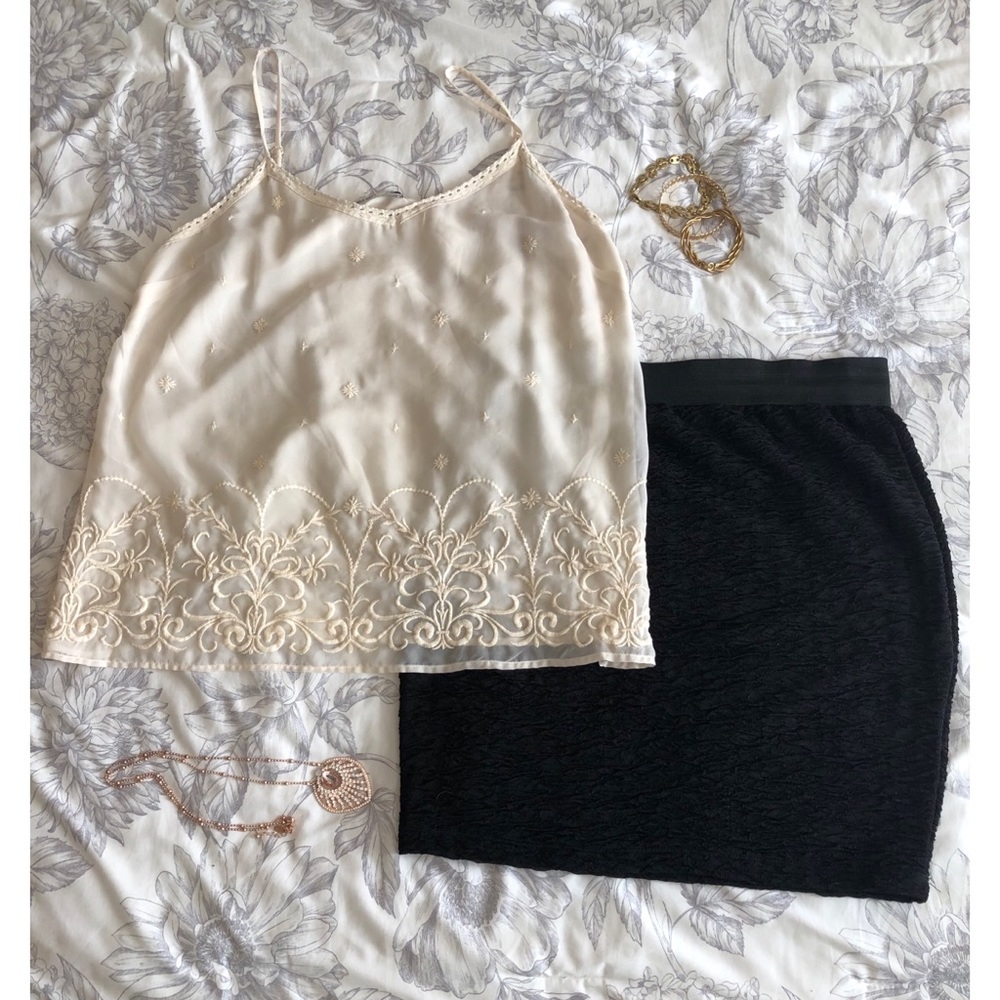 Cream spaghetti strap top with embroidery